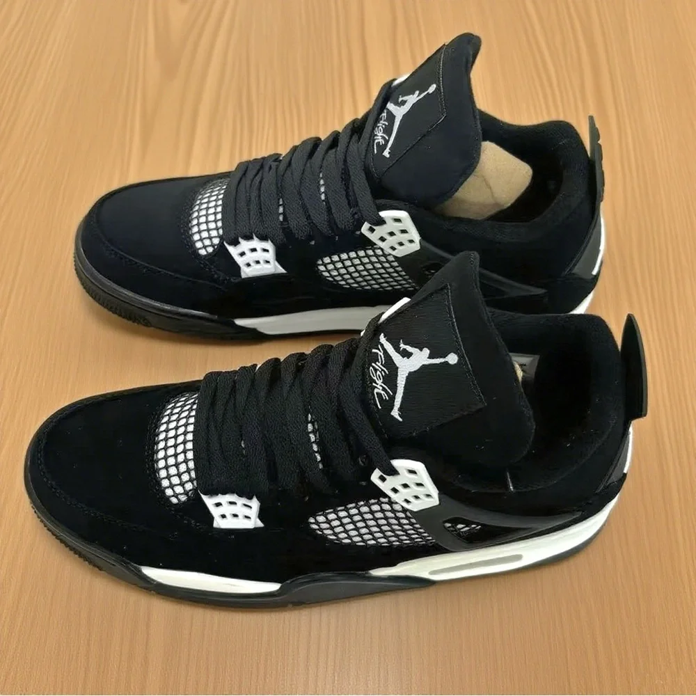 Jordan Men's Black and White Retro 4 Athletic Sneakers